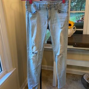 Light blue ripped jeans